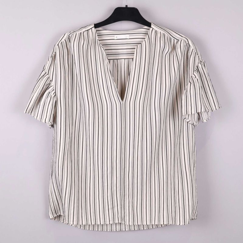 Detaljer på randig blus