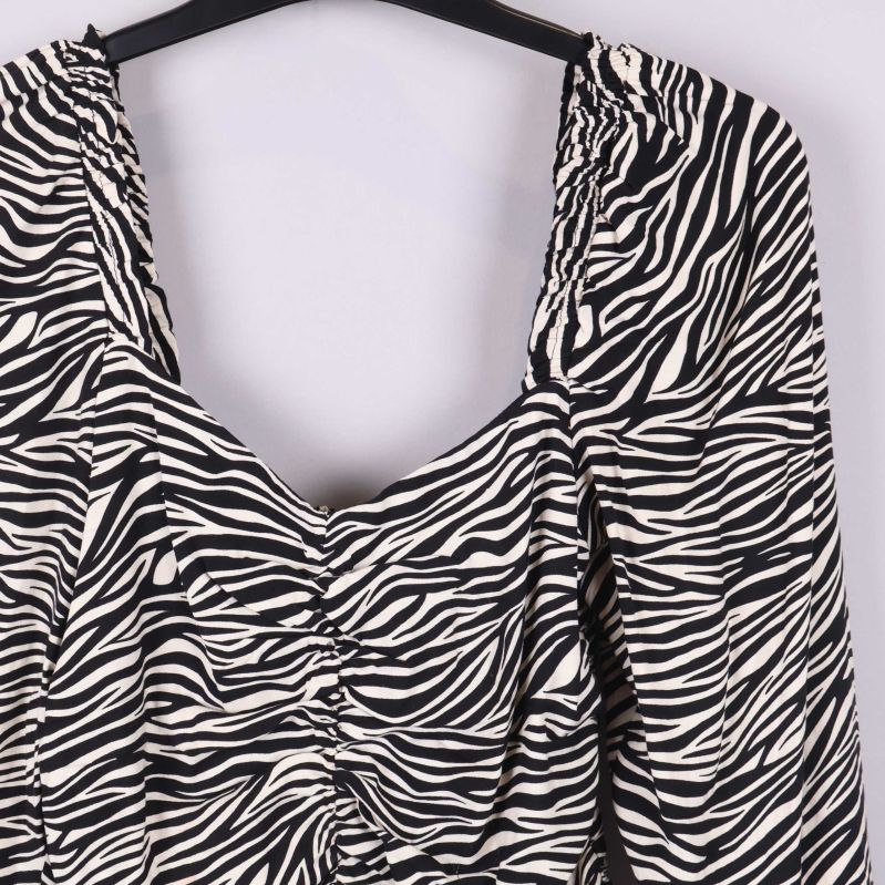 Storleksetikett med märkeslogga