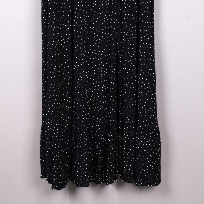 Klänningens svängande nederkant