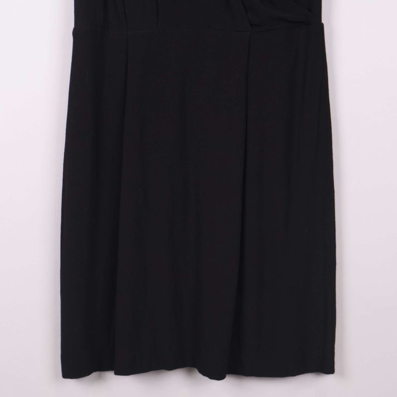 Klänningens nedre detalj