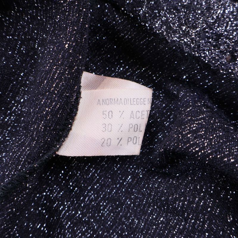 Materiallapp med information om acetat och polyester