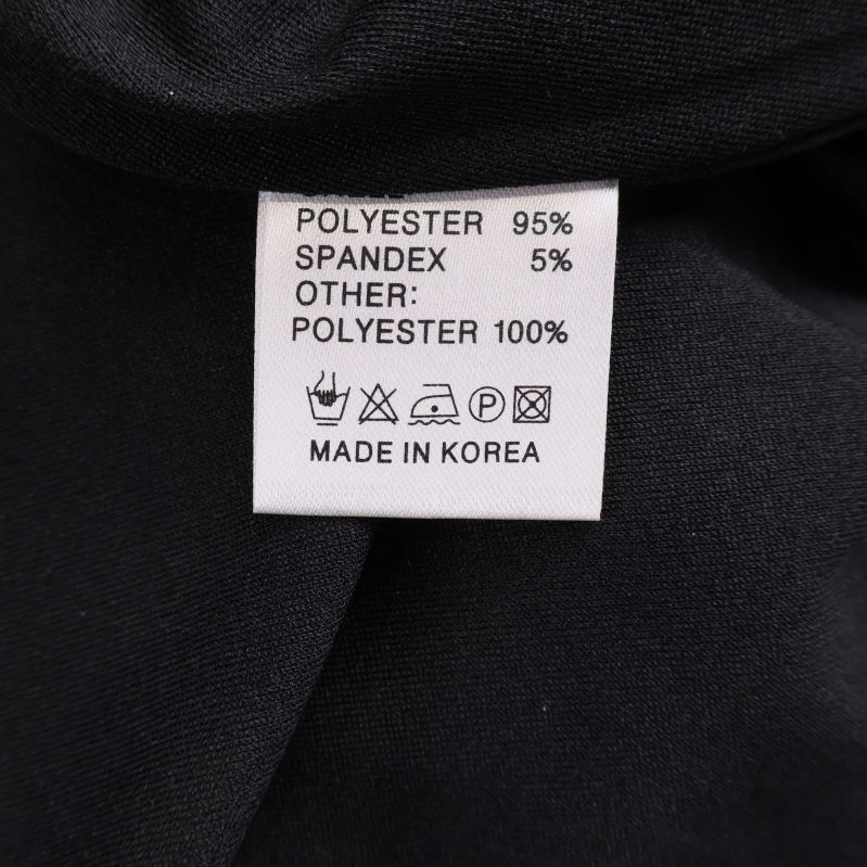 Materiallapp med polyester och spandexprocent
