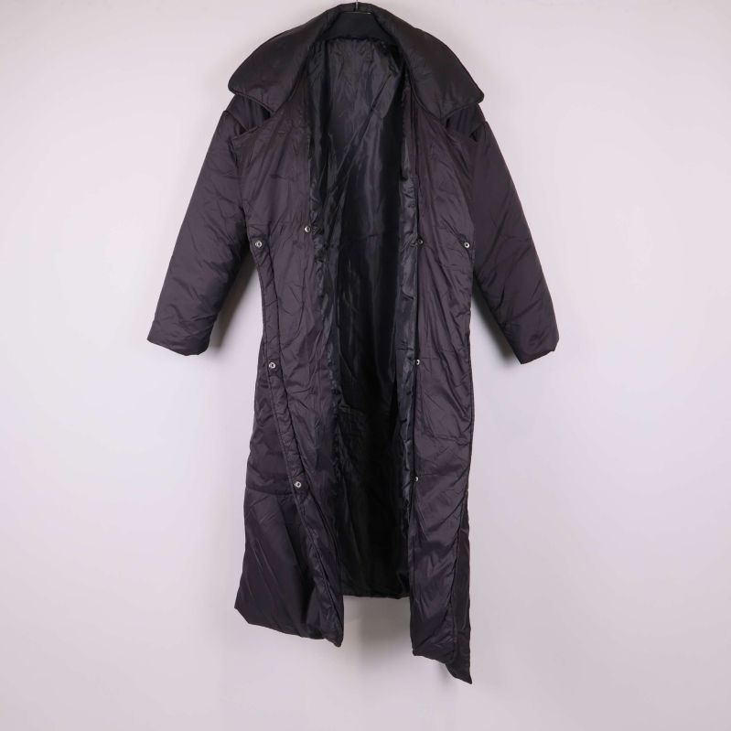 Vadderad kappa med öppen framsida och synlig insida