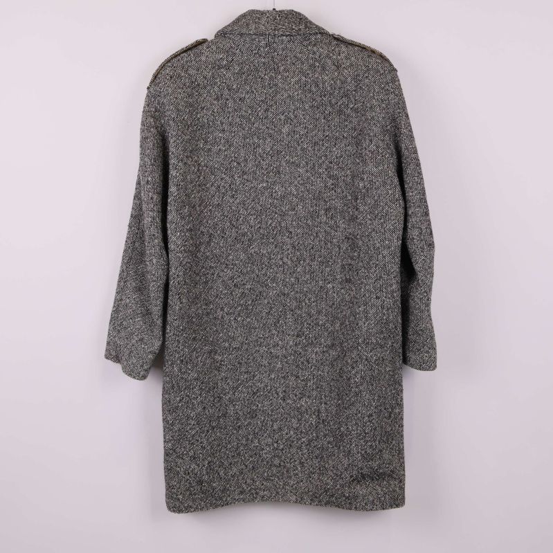 Baksidan av kappan med fiskbensmönster