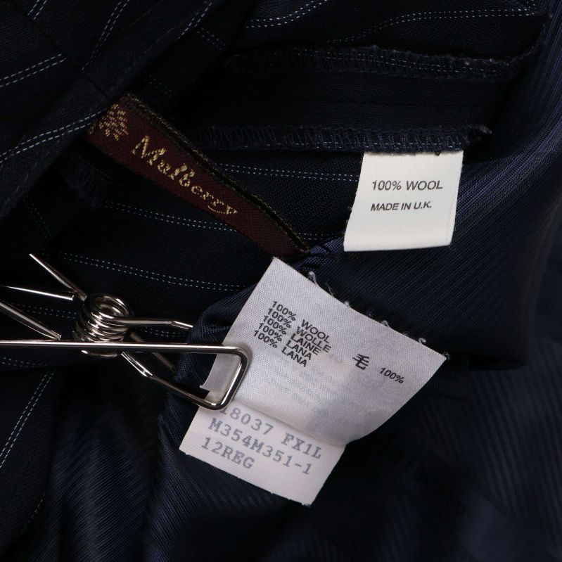 Materiallapp visar 100% ull och tillverkad i Storbritannien