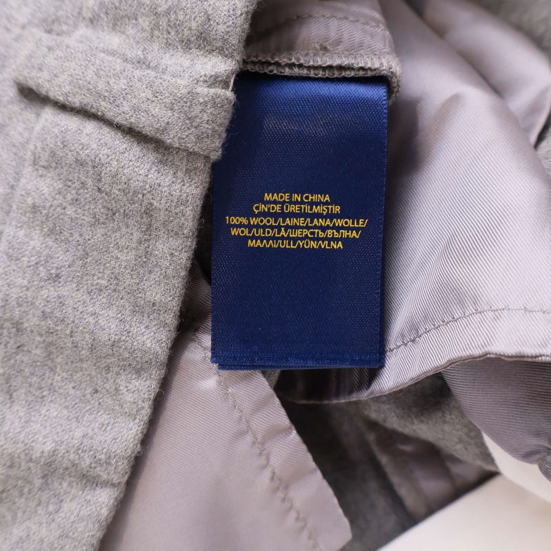 Materialetikett med information om 100% lammull