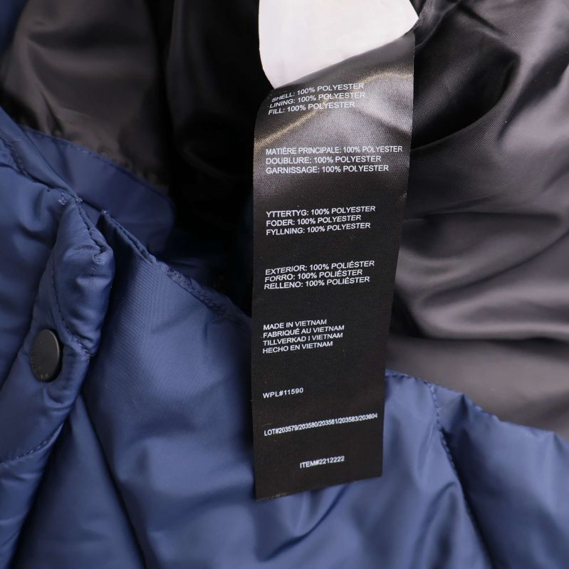 Två etiketter med materialinformation och tvättråd