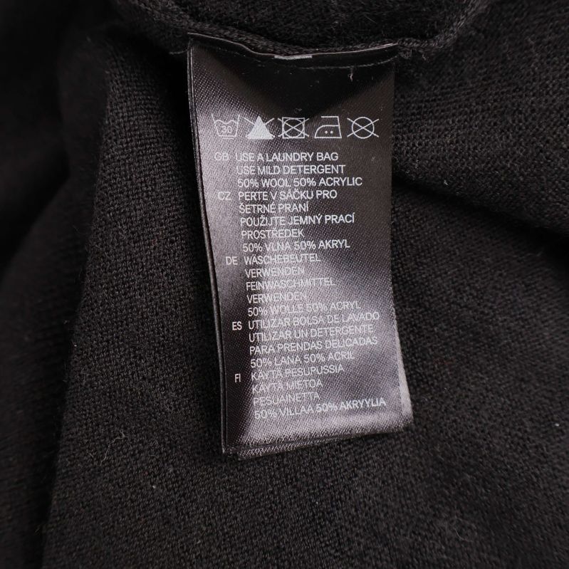 Materiallapp med tvättråd och materialinformation