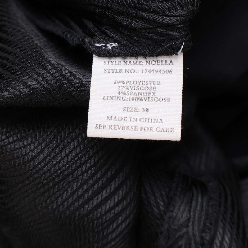 Materiallapp med materialinfo och tvättråd