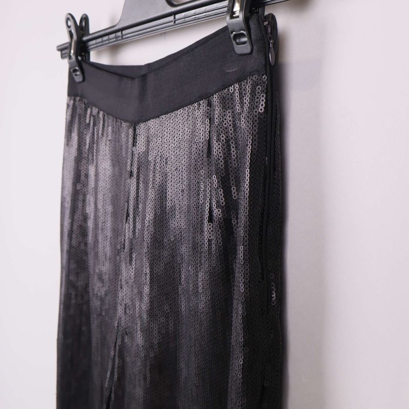 Närbild på lyster och struktur i paljettmaterialet