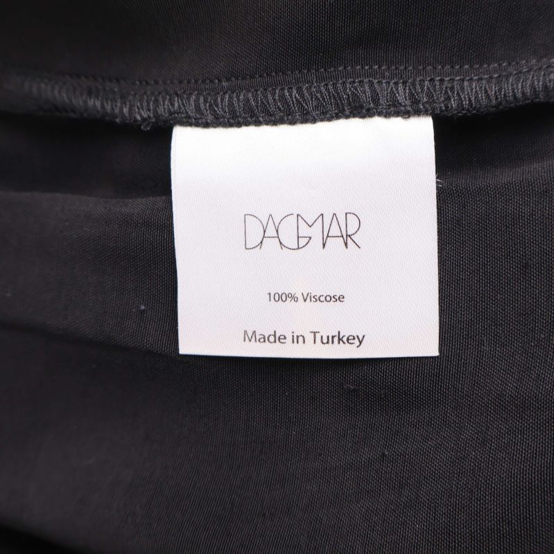 Materialetikett som anger 100% viskos