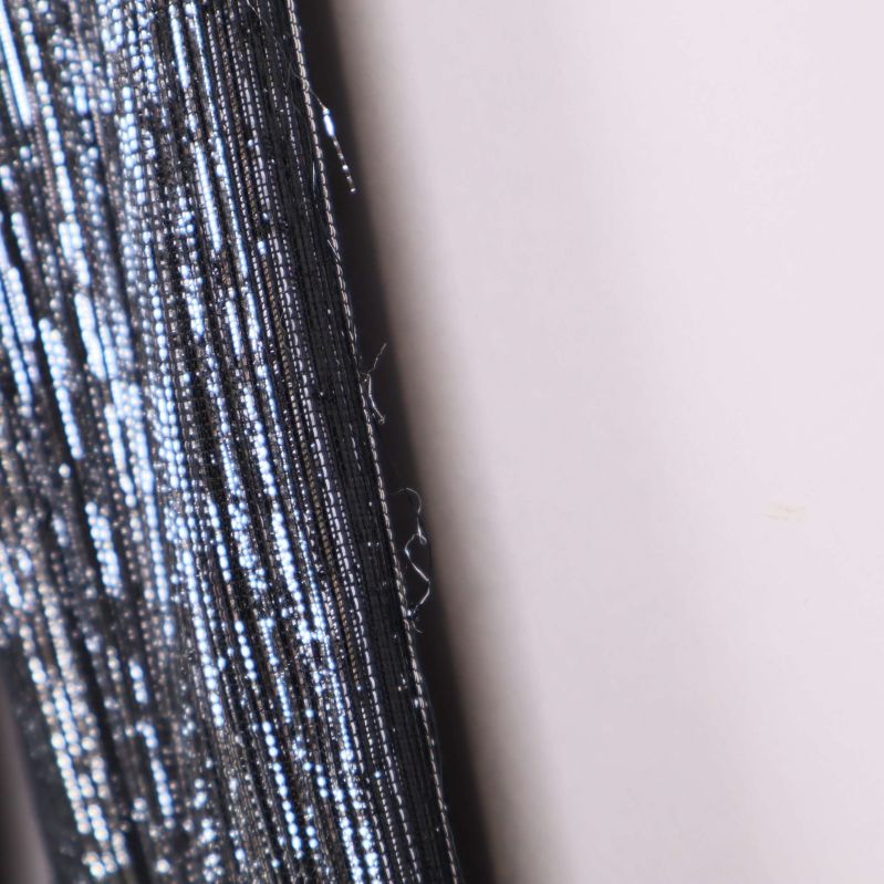 Materiallapp med tydliga procentsatser och materialinfo