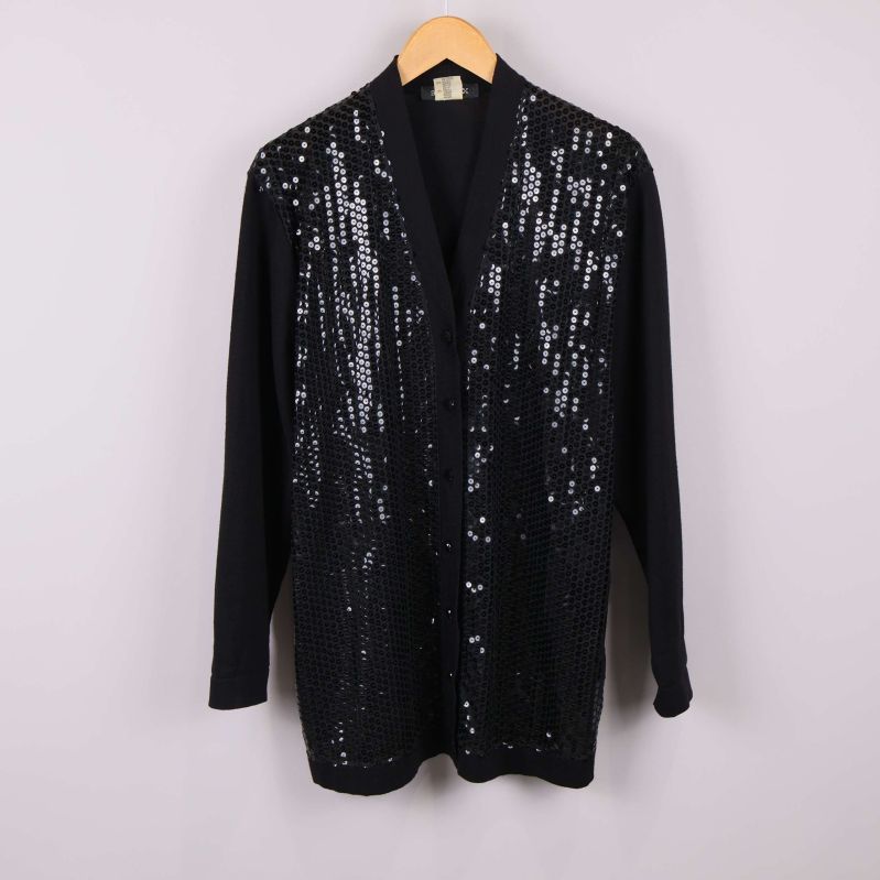 Svart kofta med paljetter på framstycket 
