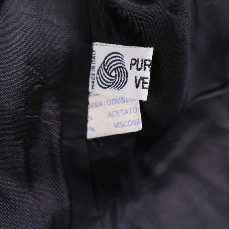 Materiallapp med ull, acetat och viskos synlig