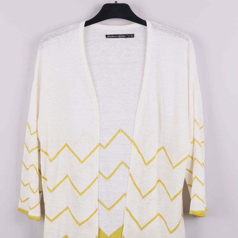 Övre delen av kofta med öppen fram och zigzagmönster