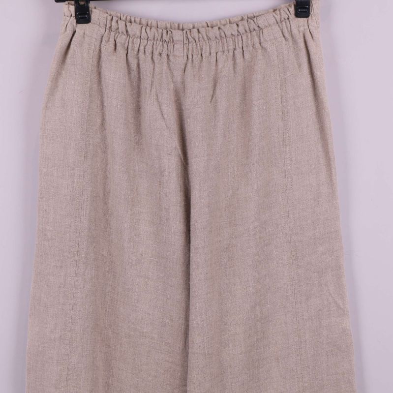 Ovandel av capribyxan med resår och tygstruktur