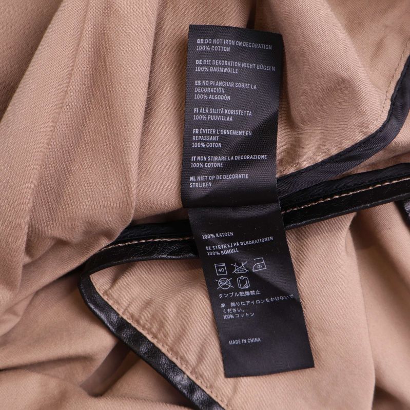 Materiallapp med detaljer om bomull och dekoration