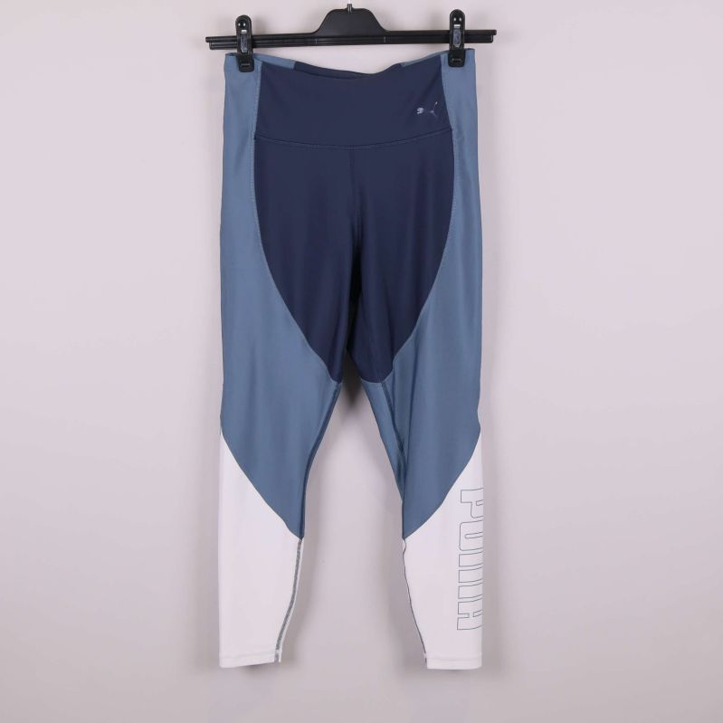 Framsida av flerfärgade PUMA tights med logga