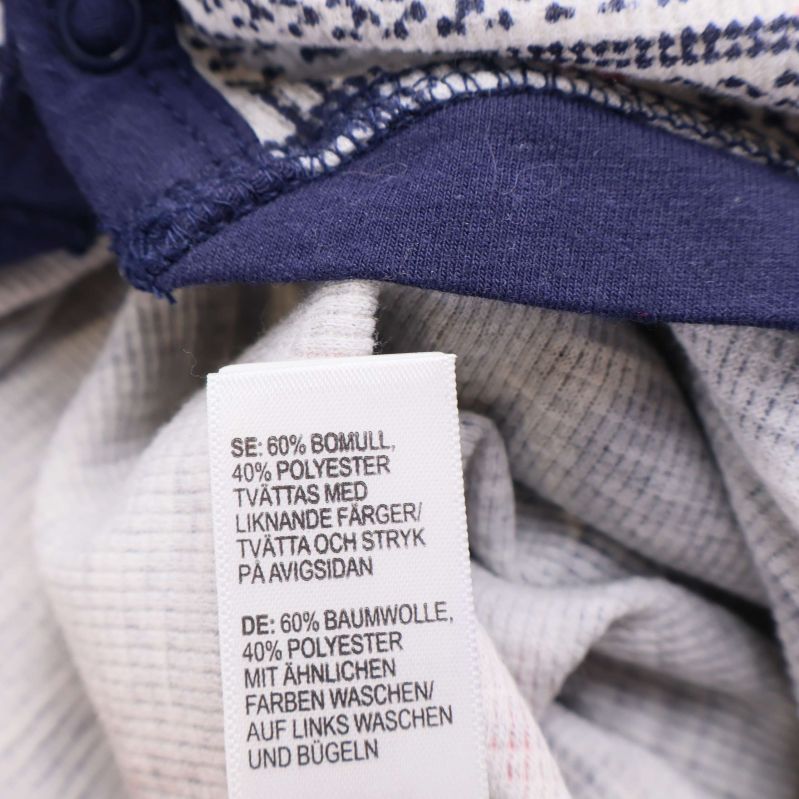 Materiallapp visar 60% bomull och 40% polyester