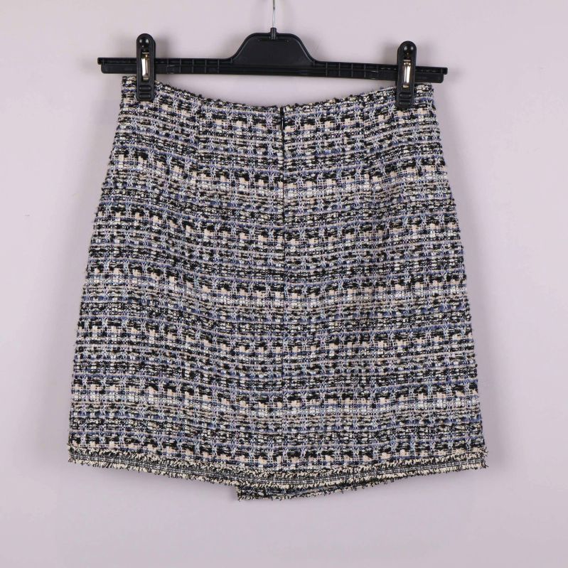 Kjolens baksida med dold dragkedja