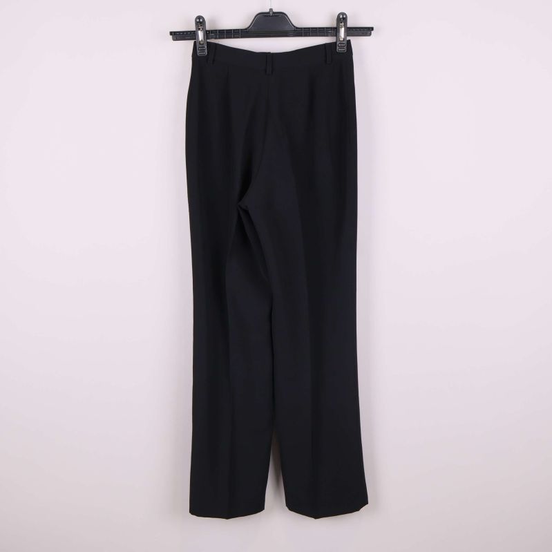 Baksida på klassiska byxor