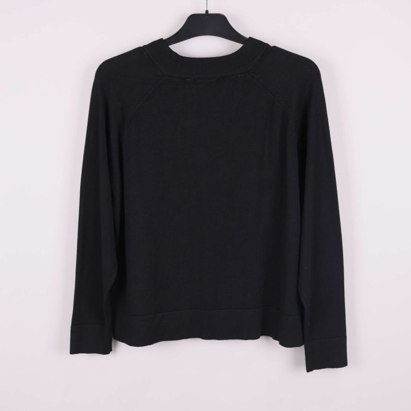 Baksida av tröjan i helbild