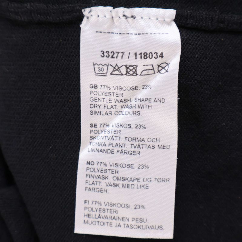 Materialinformation på textil-etikett