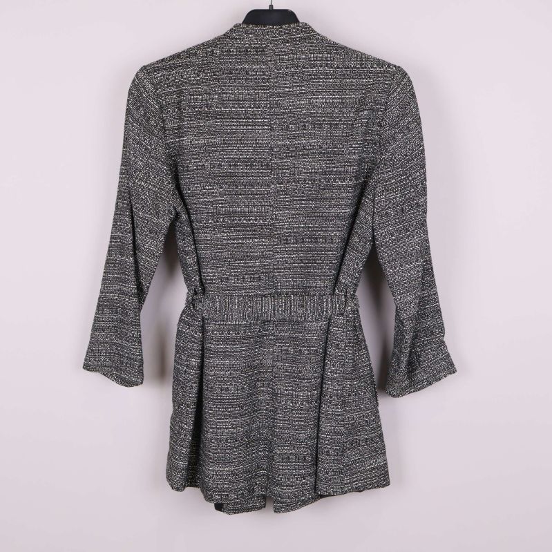 Baksida med elastisk detalj