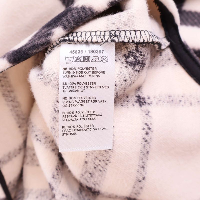 Rutigt tyg med bröstfickor