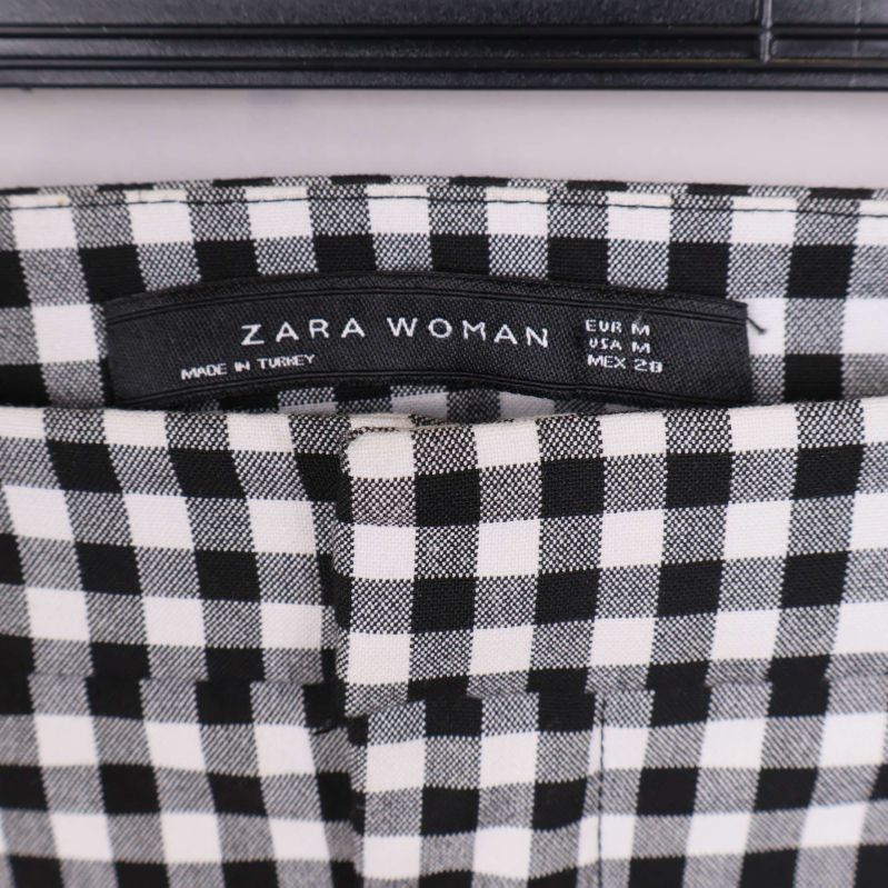 ZARA Woman-logga i linningen