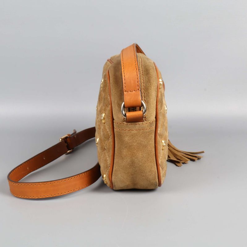 Justerbar axelrem i brunt