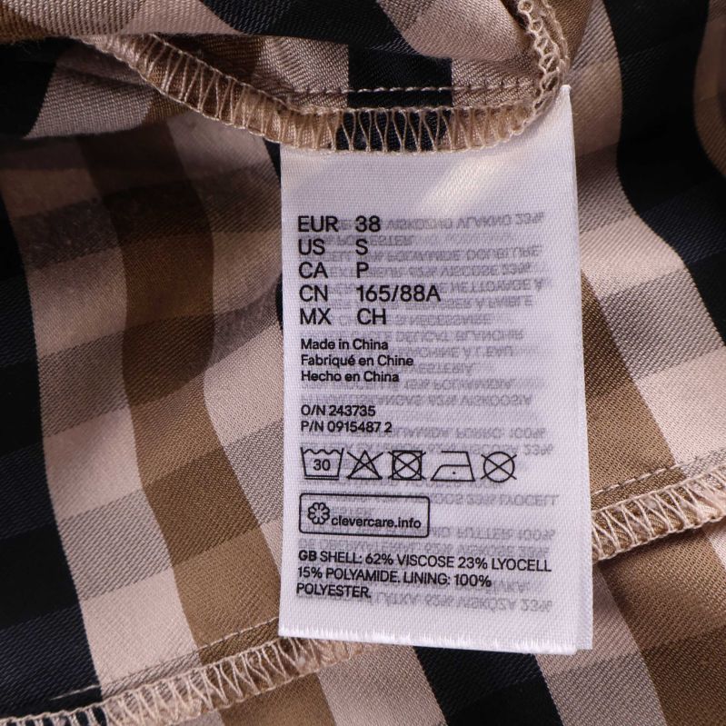 Material och skötselråd på etikett