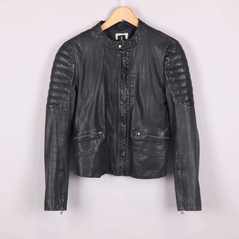 Framsida med quiltade detaljer