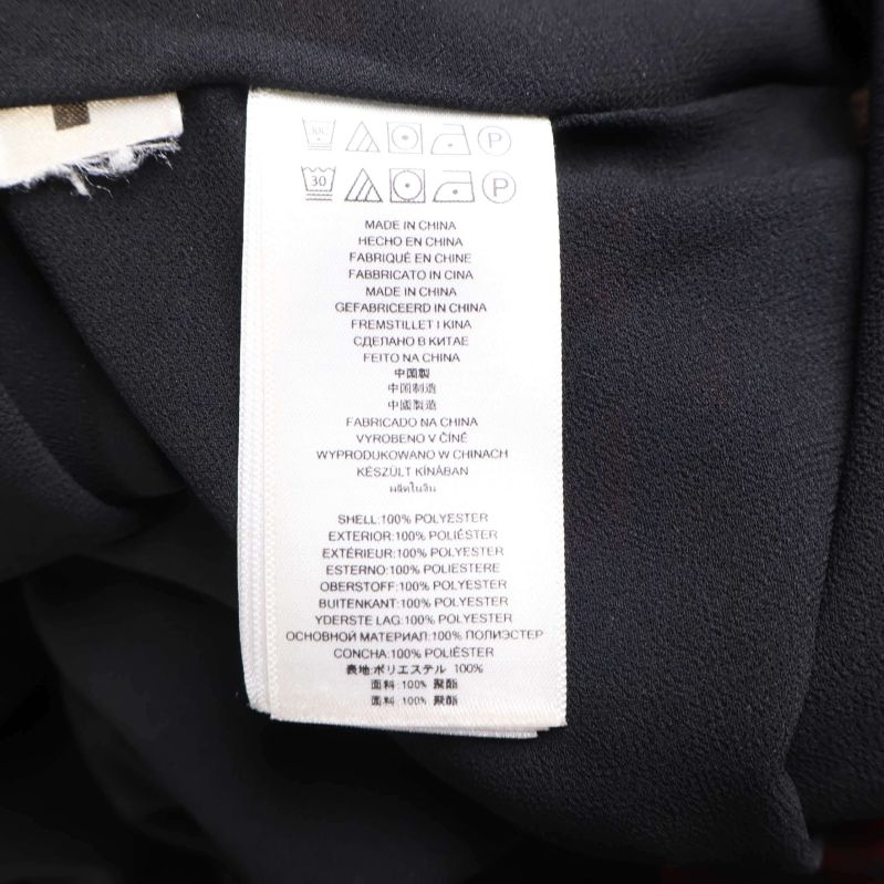 Materialinformation på klänning