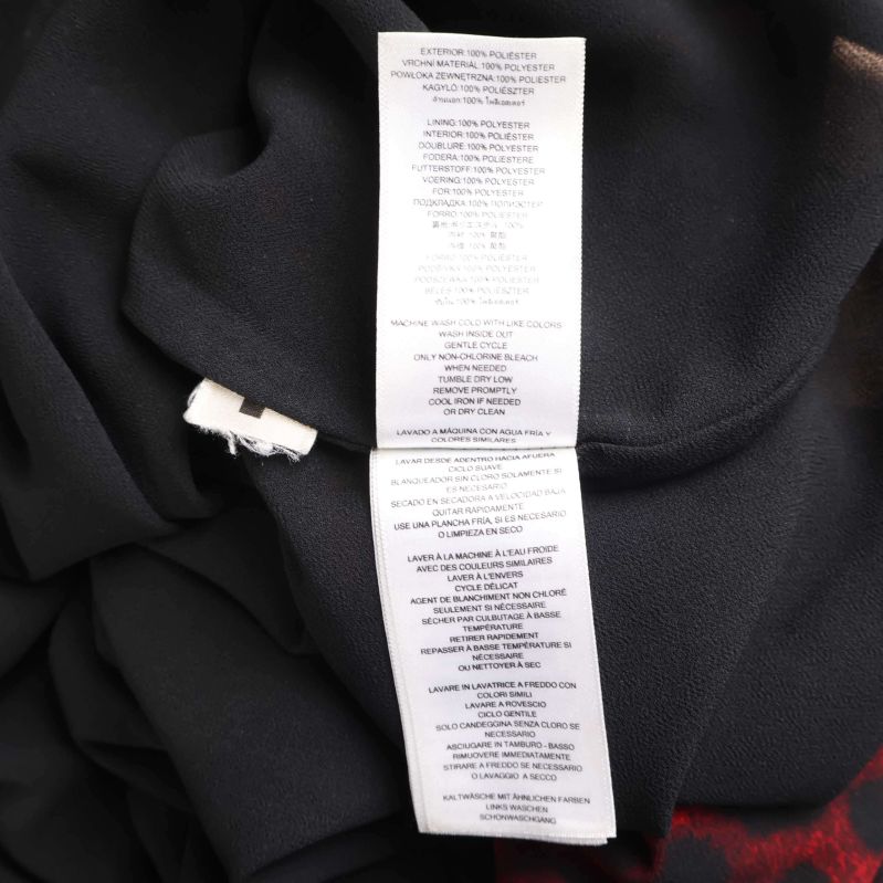 Materialinformation på klänning