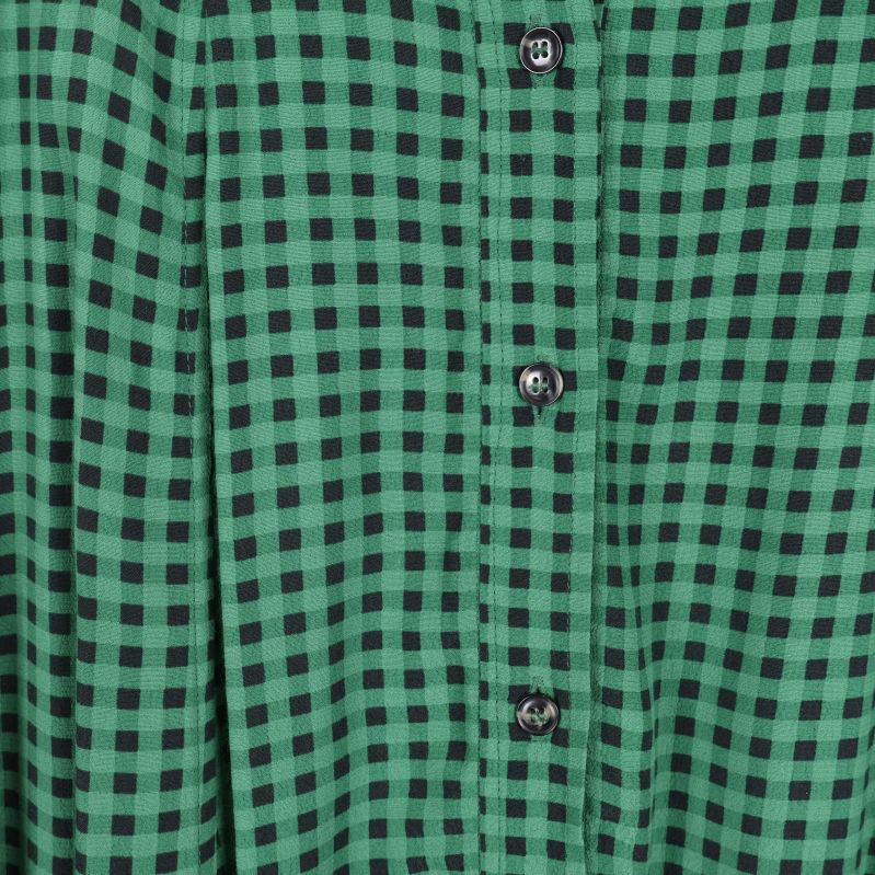 Detalj av rutigt tyg och knappar