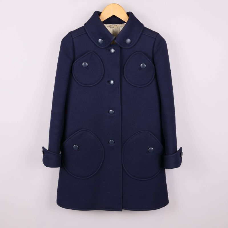 Kappa med stora runda fickor