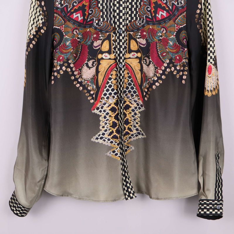 Blusens ärm med mönstrad mudd