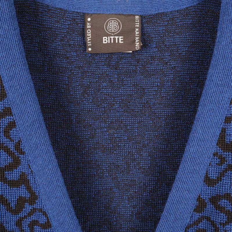 Detalj av knappar och fickor