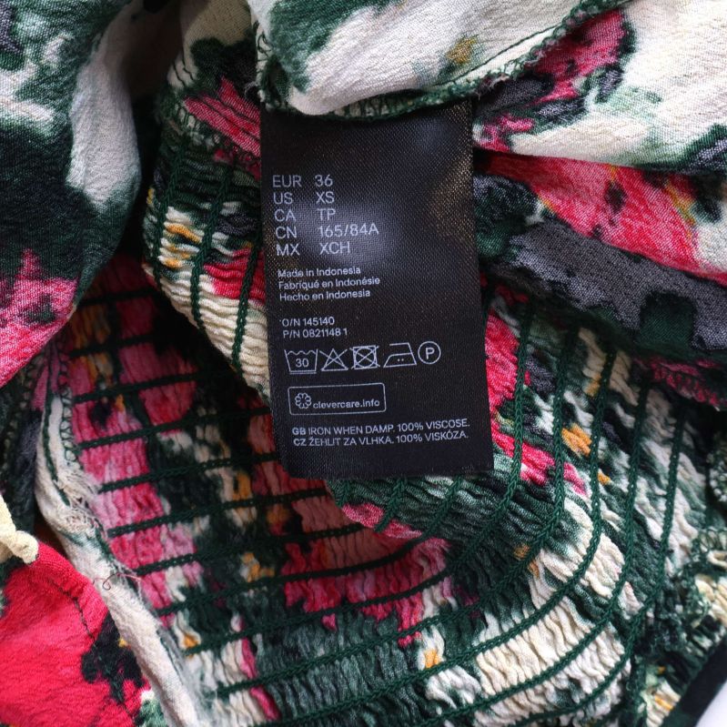 Storleksetikett med tvättråd