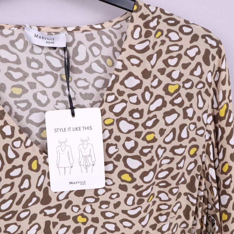 Knytband på blusens baksida