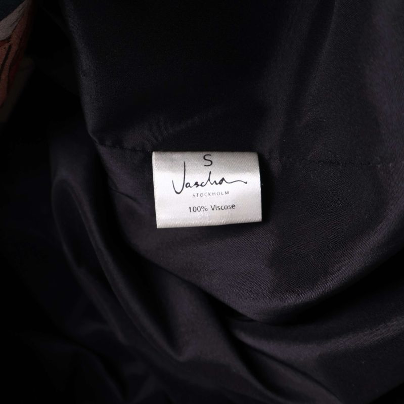 Materialetikett på jackan