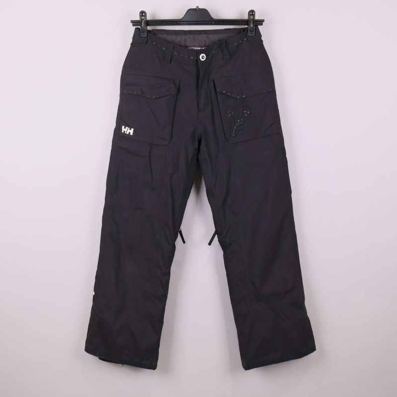 Svarta cargobyxor med fickor och vita HH-logga framtill