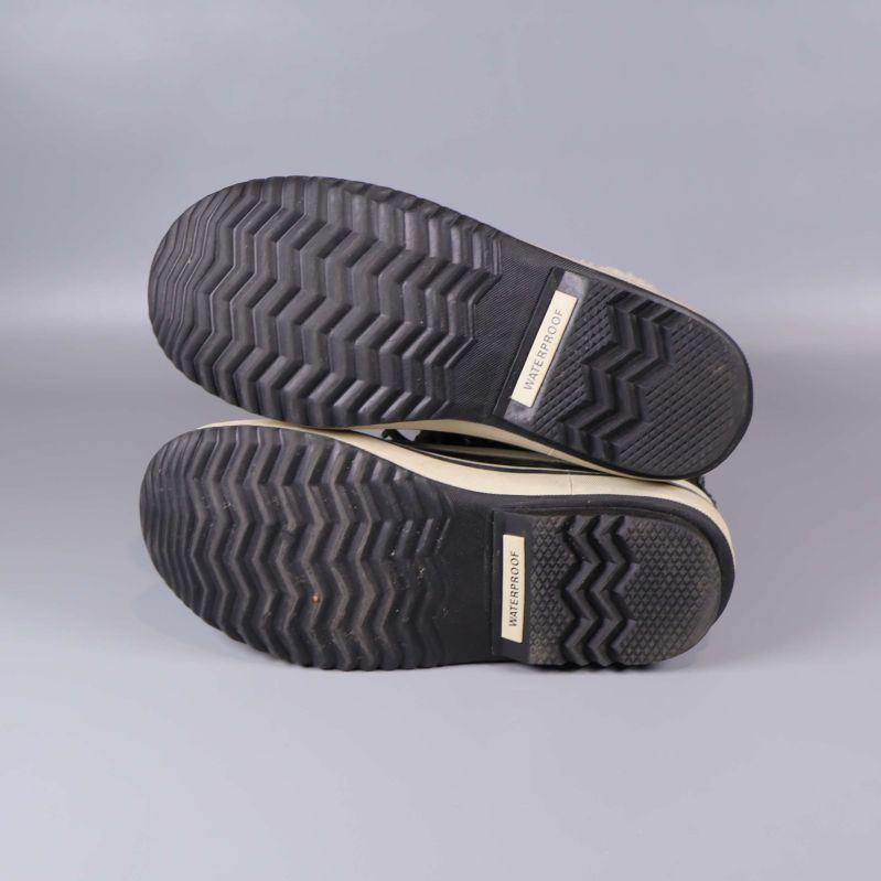 Kraftig sula med fiskbensmönster på vinterkängor