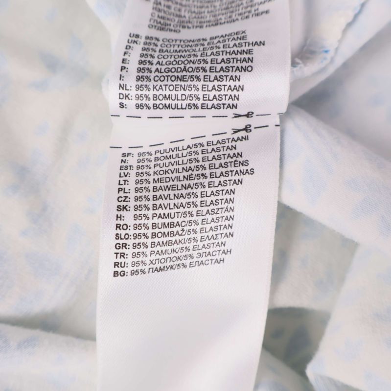 Materiallapp med information om bomull och elastan