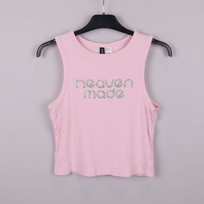 Rosa crop top med silverglittrig text heaven made