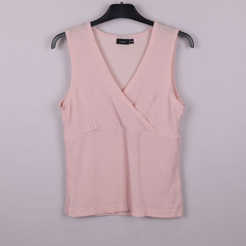 Ljusrosa omlottlinne på galge, hel framsida