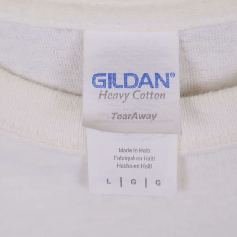 Etikett visar Gildan Heavy Cotton och storlek L