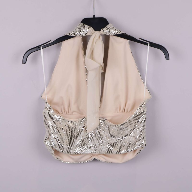 Baksidan av halterneck-topp med knytband och paljetter