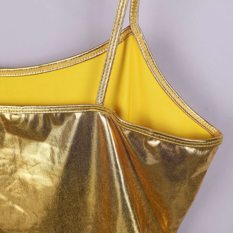 Närbild på axelband och inre tyg i gult